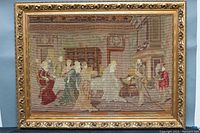 Full view of the framed needlepoint artwork showing the entire scene and gold ornate frame.