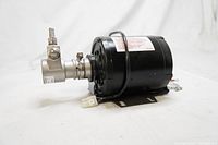 Side view of black A.O. Smith electric motor with silver pump attachment and power cord.