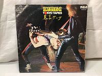 Front cover of the 1978 Scorpions Tokyo Tapes double LP showing band performing live on stage.