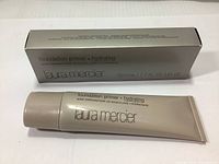 Photo of the Laura Mercier Foundation Primer Hydrating tube and its box showing front side with branding and product size.