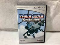 Front cover of game manual and case showing helicopter artwork and game title for Tapwave Zodiac.