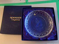 Sperrin crystal bowl inside original box showing lid with gold Sperrin Crystal logo.