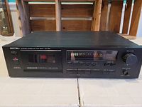 Front view of the Rotel Stereo Cassette Tape Deck RD-865 showing cassette window, digital display, control buttons, and knobs.