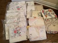 Overview of all items including plastic-wrapped linens and unwrapped assortments