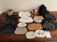 Overhead view of all evening bags arranged on wooden surface