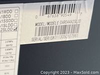 Close-up photo of the product model label showing model DAR044A2SLDD and barcode.