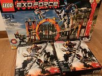 Front view of three unopened Lego boxes: Exo-Force 7709 Sentai Fortress and two Bionicle Brutaka 8734 sets