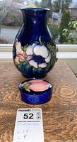 Front view of vase and closed trinket box with lot label visible