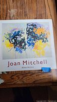 Front cover of the Joan Mitchell art book showing colorful abstract painting and title.