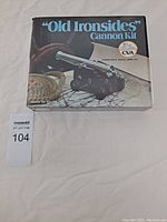 Front view of the original box for the "Old Ironsides" Cannon Kit showing the assembled cannon image and branding.