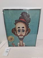 Front view of framed artwork depicting the clown labeled "Tramp Clown" by Red Skeleton, featuring a blue background and the clown holding a flower.