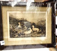 Framed antique print of hunting scene showing a man and three dogs in a mountainous outdoor setting, covered in protective wrap.