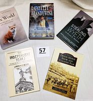 All five books including titles and author signatures visible; Chester County themes