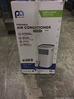 Box front showing brand, product type, and features including air conditioning, fan, dehumidifier, sleep mode, and remote control.