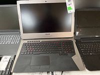Open laptop showing screen, keyboard and chassis