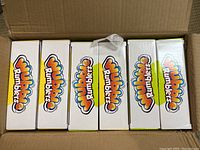 Top view photo showing six Wubble Rumblers boxes arranged inside a shipping box. Boxes prominently display Wubble Rumblers logo.