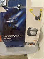 Photo of the original Sony HandyCam DCR-DVD108 box showing product image and model number.