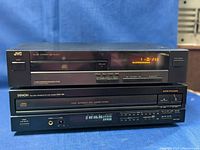 Front view of two stacked units against blue background