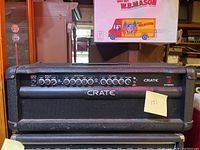 Front view of the Crate GT1200H amplifier showing the full control panel and speaker grille.