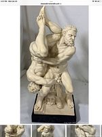 Front and side views of the Hercules and Diomedes statue showing the muscular figures, pose and base.