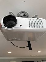Side view of projector lens and mounting hardware