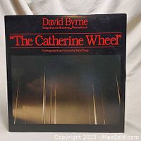 Front cover of the vinyl record album showing the title 'The Catherine Wheel' by David Byrne.