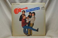 Front cover of The Monkees' 'Headquarters' vinyl album showing the band posing together with album title and RCA Victor logo.
