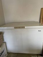 Front exterior of chest freezer in garage