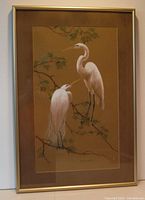 Photo showing the full framed artwork featuring two white cranes on branches signed by Dolores Witt.