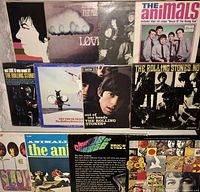 All 12 LP records from The Rolling Stones and Eric Burdon & The Animals laid out in a grid, showing album covers and artwork.
