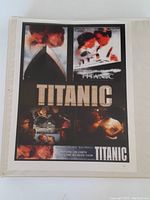 Cover page with Titanic movie poster collage featuring main characters and title.
