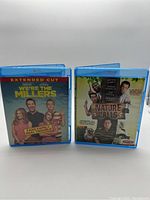 Front covers of the two Blu-ray cases "We're the Millers" and "Nature Calls" showing artwork and titles.