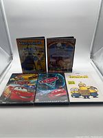 Front view of the five DVD cases: Megamind, Ratatouille, Cars, Cars 2, and Minions.