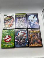 Photo of six DVD covers including Space Jam, Beetlejuice, E.T., Ghostbusters (two editions), and The Goonies.
