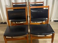 Front view showing four chairs assembled