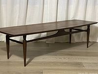 Full length view of table showing overall form and finish