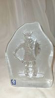 Front view of clear textured glass Viking figure sculpture with Berdgala label.