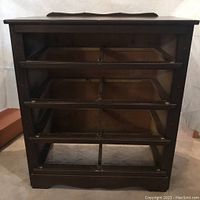 Photo of back showing open drawer spaces and construction