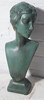Three-quarter front view showing overall form, paint finish and base