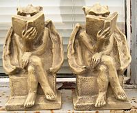 Front view of both gargoyle bookends facing forward, showing full figure and front details