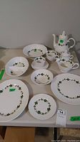 Entire Marlborough Old English china set of 4 items displayed on table including teapot, gravy boat, cream and sugar, plates, cups and saucers
