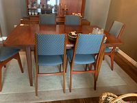 Front view of cherry wood table and six matching chairs