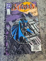 Front cover of Batman comic issue #440, showing Batman crouching over a city background with the title A Lonely Place of Dying Part 1 of 5 and credits to Wolfman, Perez, Aparo & DeCarlo.