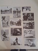 Full set of 12 black and white James Bond trading cards displayed on a light surface, showing various scenes of Sean Connery from Thunderball and one card of Roger Moore.
