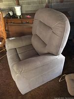 Side angle view showing chair profile and upholstery