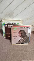 Front view of the Ghazals by Ghulam Ali record cover and partial view of other records stacked behind.