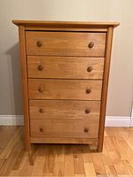 Front view of dresser showing five drawers