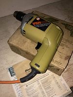 Black and Decker variable speed drill model 7127 with original box and manuals