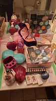 Overview of all lot items displayed on bathroom countertop mirror