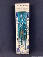 Blue Willow Design 3-piece carving set in original box, blue and white melamine handles visible, stainless steel blades.